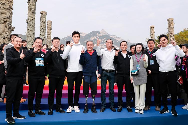新澳门今晚开奖结果查询表图片和戴假肢3次登顶泰山与戴假肢3次登顶泰山会怎样
